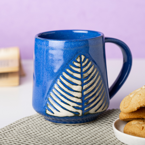 Thumbnail preview #4 for Blue Ceramic Coffee Mug with White Leaf Design