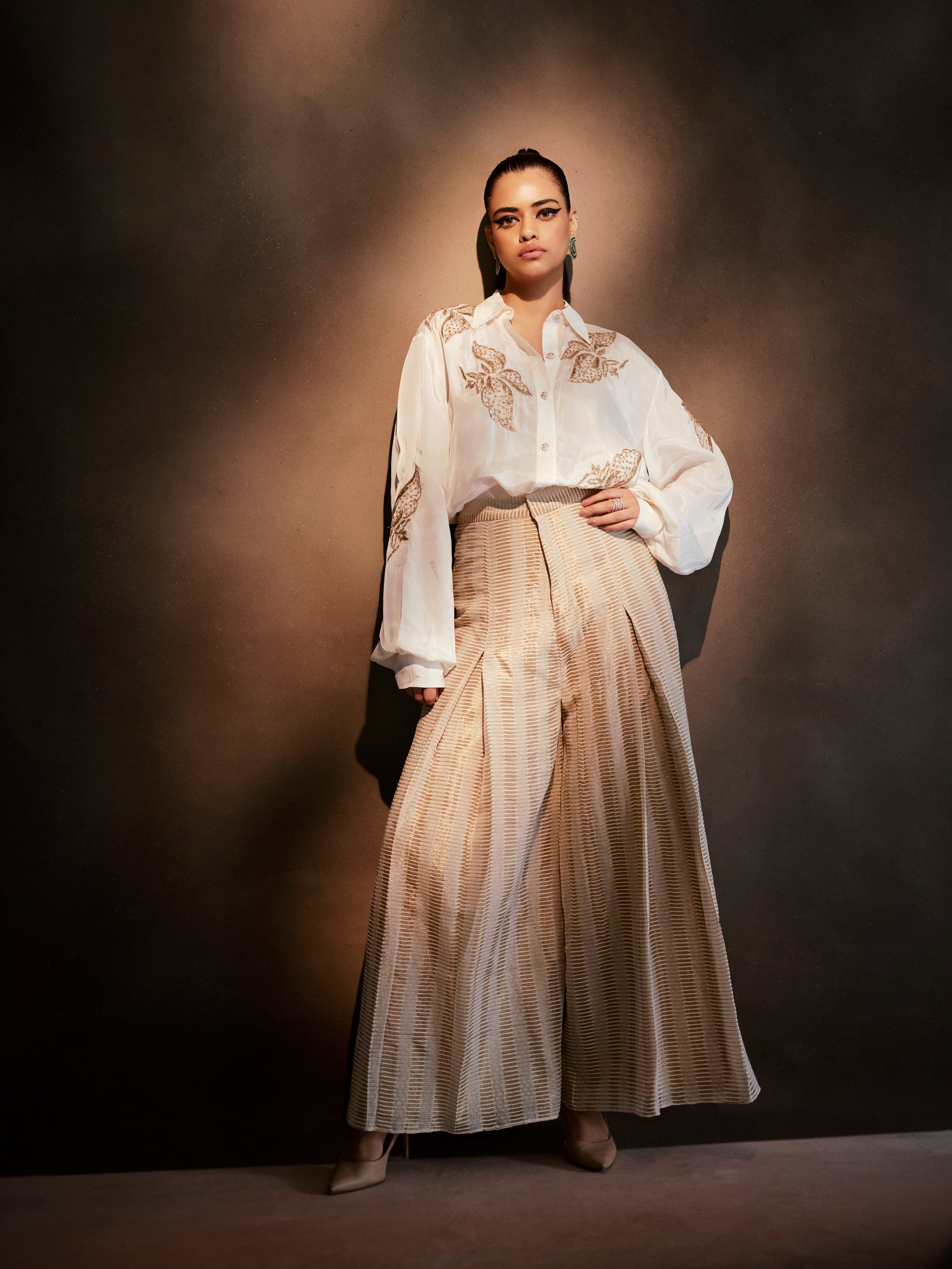 White silk shirt paired with Banarasi weave Pants, a product by Aashima Behl 
