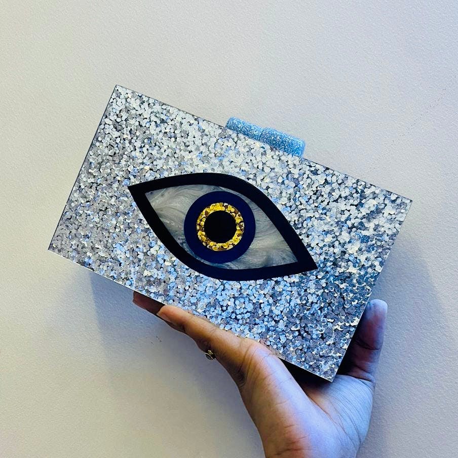 Silver Evil Eye Clutch, a product by Clutcheeet