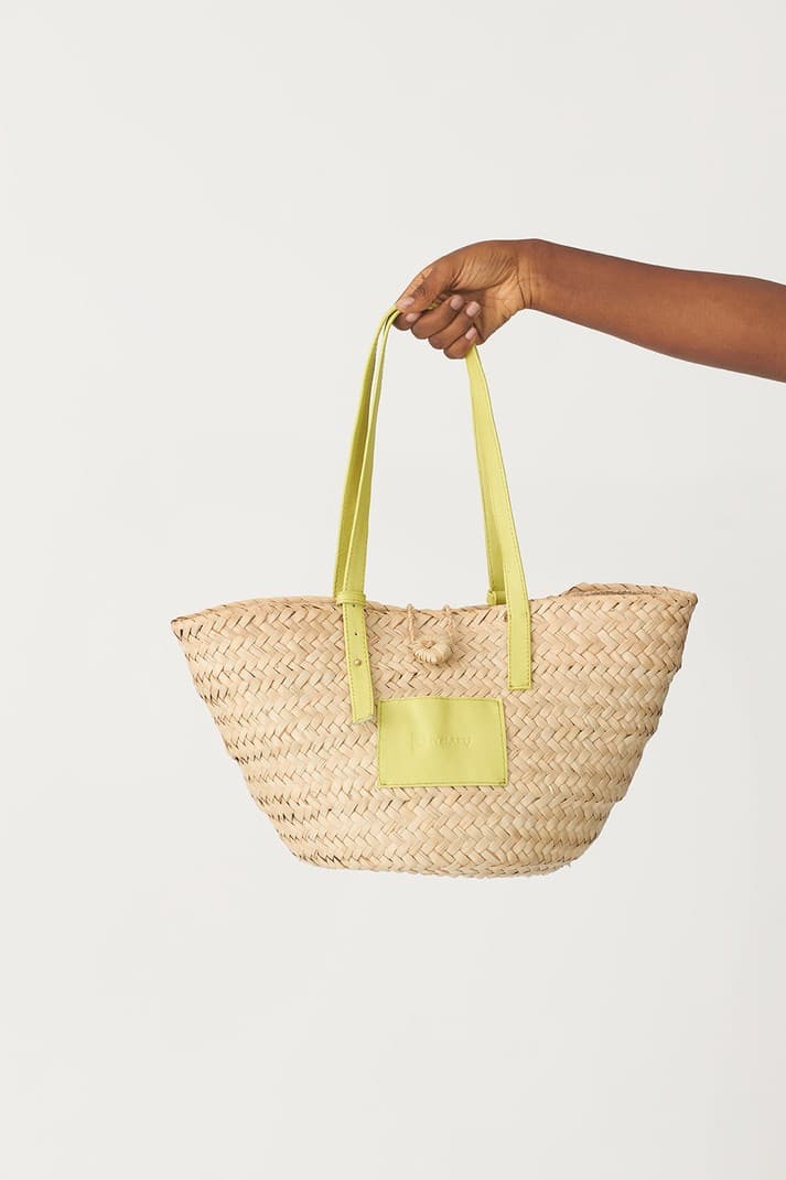 Njem leather-trimmed raffia tote (Chartreuse Green), a product by KWELAKU