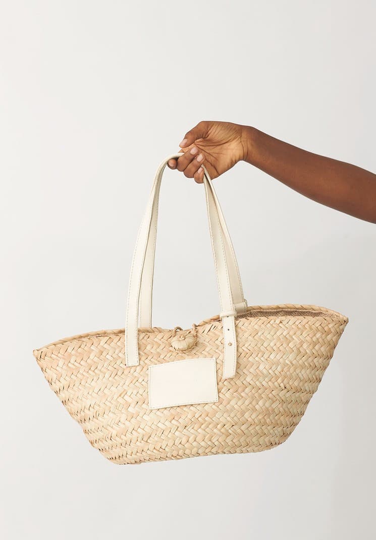 Njem leather-trimmed raffia tote (Ecru White), a product by KWELAKU