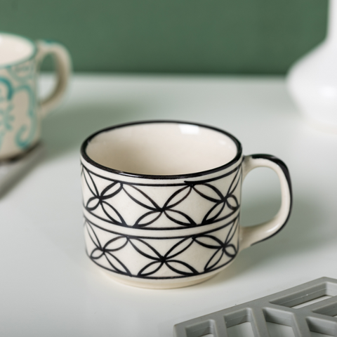 Thumbnail preview #1 for Black Floral White Color Ceramic Tea Cup with Design