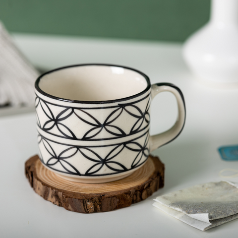 Thumbnail preview #0 for Black Floral White Color Ceramic Tea Cup with Design